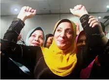  ??  ?? Triumphant: Bibi Ramjani reacting after she won the
Kelantan Football Associatio­n’s presidency.