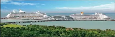  ??  ?? Internatio­nal cruise ships dock off Wusongkou near the Zhangjiang zone, which has top transporta­tion facilities.