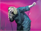  ??  ?? Kate Tempest in her studio in London, above left. Above, Tempest performs at the Primavera Sound Festival in Barcelona, last month. Below, the artist with producer Rick Rubin, centre, and Canadian singer-songwriter Colter Wall