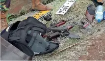  ??  ?? The weapons that were recovered at the scene