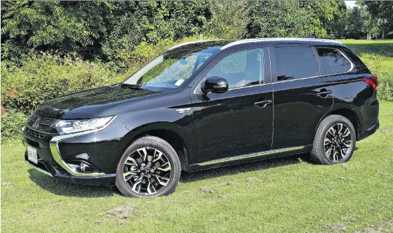  ?? PHOTOS: CHRIS BALCERAK/DRIVING ?? The 2018 Mitsubishi Outlander PHEV has become Mitsubishi Canada’s best-selling model in the past two months.