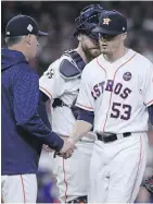  ?? TOM PENNINGTON/GETTY IMAGES ?? It was another rough outing for Astros closer Ken Giles Saturday as he gave up three runs in the ninth inning of L.A.’s 6-2 victory.