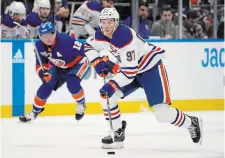  ?? JOHN MINCHILLO THE ASSOCIATED PRESS FILE PHOTO ?? Connor McDavid heads into the NHL all-star break with a league-leading 92 points in 50 games.