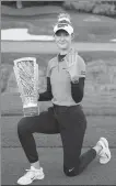  ?? AP ?? Nelly Korda poses with the trophy after winning the LPGA Match Play tournament at Shadow Creek in Nevada.