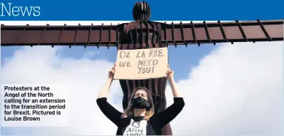  ??  ?? Protesters at the Angel of the North calling for an extension to the transition period for Brexit. Pictured is Louise Brown