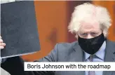  ??  ?? Boris Johnson with the roadmap