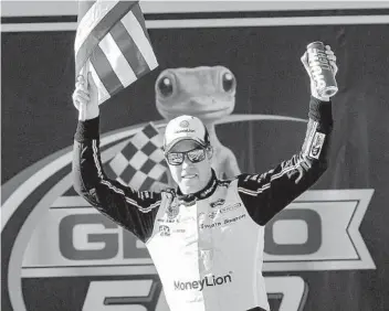  ?? BUTCH DILL AP ?? Brad Keselowski celebrates after winning the NASCAR Sprint Cup race at Talladega Superspeed­way.