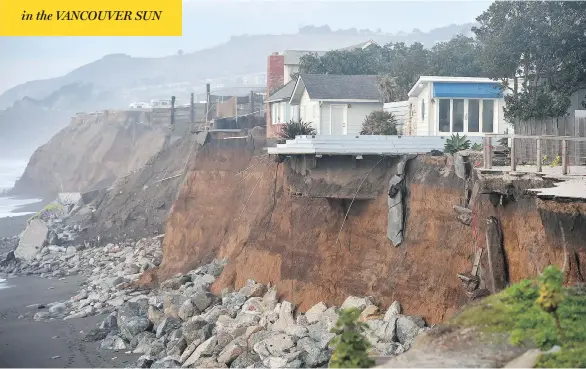  ?? JOSH EDELSON/AFP/GETTY IMAGES ?? As erosion and rising sea levels put beachfront houses in peril, some U.S. homeowners are vowing to stay and fight, and some towns are spending millions to restore shorelines.