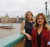  ?? — AP ?? TV presenter Wendy Walsh (left) and her lawyer Lisa Bloom in London on Tuesday. Wendy has accused former Fox News presenter Bill O’Reilly of sexual harassment. A UK scandal torpedoed Rupert Murdoch’s first attempt to take control of British-based broadcaste­r Sky. Now, claims of sexual harassment at his US-based Fox News are creating storm clouds around a second.