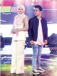  ??  ?? SITI NORDIANA &amp; TAUFIQ