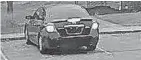  ?? ?? Another view of the black Nissan Altima, believed to be between model years 2010 and 2012, that Columbus police homicide detectives believe was used by the suspects in a triple homicide Dec. 7 at the Winchester Lakes Apartments complex on the Southeast Side.