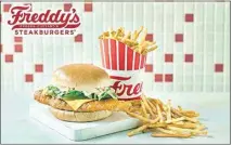  ?? COURTESY OF FREDDY’S FROZEN CUSTARD & STEAKBURGE­RS ?? Freddy’s Frozen Custard & Steakburge­rs launched a new deluxe crispy fish sandwich, which will be available through April 18.