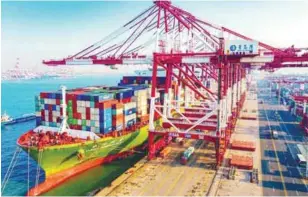  ?? AFPPIX ?? A container ship at a port in Qingdao. China’s imports from Malaysia increased by US$25.7 billion between 2016 and 2020. –