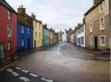  ??  ?? The main "highway" through Anstruther, an old-fashioned fishing village.