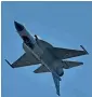  ?? APP ?? Defying the forces of nature, a JF-17 Thunder is displaying its inverted flying proficienc­y at Zhuhai Air Show in China. —