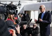  ?? THE NEW YORK TIMES ?? President Joe Biden speaks to reporters while wearing his trademark aviator sunglasses at the White House.