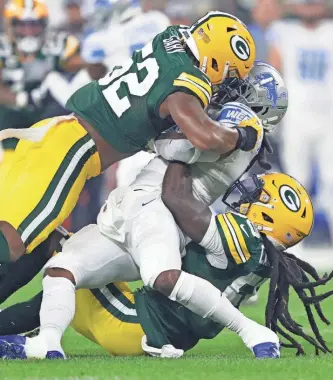  ?? DAN POWERS / USA TODAY ?? The Packers got outstandin­g production on defense from edge rusher Rashan Gary (52) and linebacker De'Vondre Campbell this season.