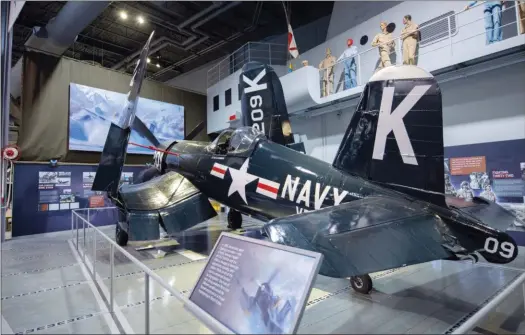  ?? EAA ?? La nouvelle exposition consacrée aux pilotes de la guerre de Corée par le musée de l’EAA, à Oshkosh dans le Wisconsin, a été inaugurée le 23 avril dernier.