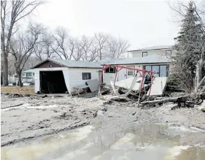  ??  ?? Spring flooding caused severe damage to this home at Lakeview Beach on Katepwa Lake in Saskatchew­an.