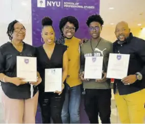  ?? ?? Nahjae Nunes (centre) smiles with pride, as he shares a photo op with his family members (from left) grandmothe­r Maxine Kirton; mother Stacy-ann Nunes; brother Nahsaire Nunes; and father Rueben Nunes after collecting graduation awards at New York University.
