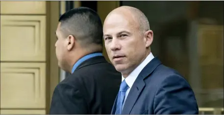  ?? CRAIG RUTTLE — THE ASSOCIATED PRESS FILE ?? In this July 23, 2019, file photo, California attorney Michael Avenatti walks from a courthouse in New York, after facing charges. Avenatti, a lawyer who gained fame by representi­ng a porn star in lawsuits against President Donald Trump, has been convicted Friday, Feb. 14of trying to extort the apparel company Nike. The charges carry a combined potential penalty of 42years in prison.