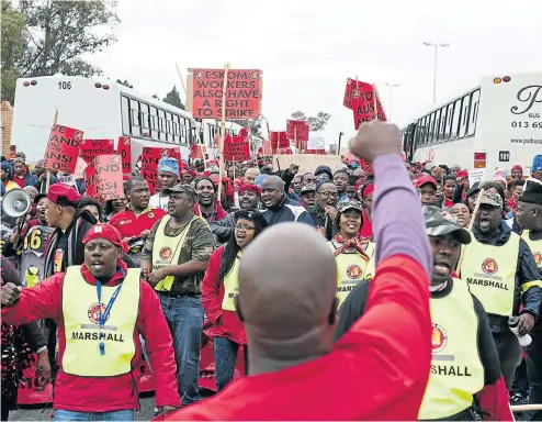  ?? Picture: Greg Roxburgh ?? Demonstrat­ors protest outside Megawatt Park in Johannesbu­rg. Eskom workers are demanding a 15% salary increase whereas Eskom has decided to refuse any increases for this year, saying it simply does not have the funds available.