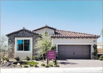  ??  ?? Century Communitie­s This residence at 9573 Wildflower Vista Ave. is a former model home that is now available for sale at Century Communitie­s’ Alpine Crossings neighborho­od in Skye Canyon.