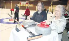  ?? NICK BRANCACCIO ?? Essex County Sports Hall of Fame inducted Alice Bell, right, prepares to curl with daughter Susan Yester at Roseland.