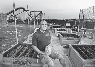  ?? Ronald Cortes / Contributo­r ?? Jacob J. Dell, Magic in the Sky owner, checks the fireworks for the June 6 show at Six Flags Fiesta Texas. He says the work for a 20-minute show at night begins early that day.