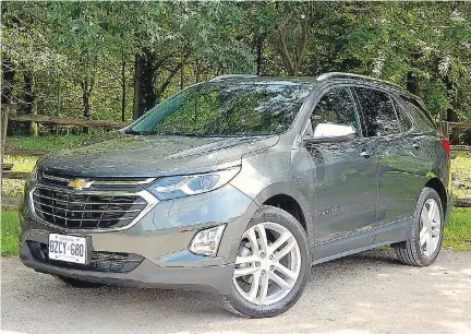  ?? BRIAN HARPER/DRIVING ?? The 2018 Chevrolet Equinox might not boast a drop-dead gorgeous exterior but it does offer a smooth and lively ride, provides decent towing power, handles well and goes easy on fuel.