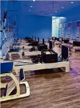  ?? Courtesy Saam Arshad ?? A photo provided by Club Pilates taken inside its upcoming Colonie studio ahead of next month’s opening shows rows of reformer machines.