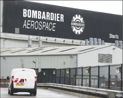  ?? AP PHOTO ?? The Bombardier Aerospace plant in Belfast, Northern Ireland. is shown earlier this month. Quebec Premier Philippe Couillard says he wants Ottawa to take a hard line against Boeing after the U.S. Department of Commerce proposed a hefty 219 per cent...