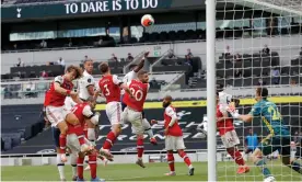  ??  ?? Toby Alderweire­ld (second left) heads home Tottenham’s winner against Arsenal. Photograph: Tom Jenkins/NMC pool