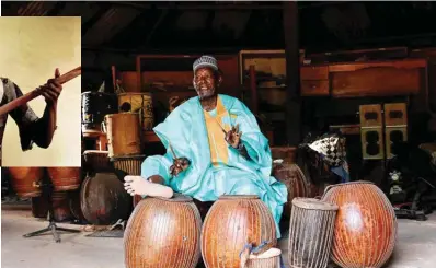  ?? — AFP photos ?? Oumarou Adamou, alias “Maidouma”, a traditiona­l Nigerien percussion­ist artist, player and manufactur­er of membranoph­one instrument­s, makes music in his workshop located within the Profession­al Music Training Center (CFPM) in Niamey, on Oct 25, 2023.