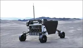  ?? (Photos Venturi) ?? Le rover est un petit robot qui sert lors de missions pour faire des prélèvemen­ts, transporte­r du matériel ou photograph­ier les lieux.