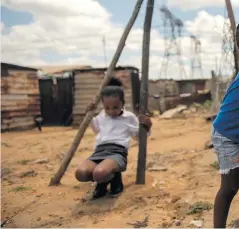  ?? ?? Princess Mathebula (8) and her sister Asemahle (4) are both immunocomp­romised They live in Vosman in an area of the Highveld known for its heavy air pollution.