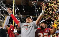  ?? The Associated Press ?? DYNASTY CHIEFS: Kansas City Chiefs’ Patrick Mahomes, left, and Tyrann Mathieu celebrate after defeating the San Francisco 49ers in Super Bowl 54 Sunday in Miami Gardens, Fla.