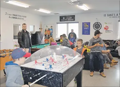  ?? ELIZABETH PATTERSON/CAPE BRETON POST ?? People of all ages came to the Whitney Pier Youth Club on Saturday to inspect the premises after the club’s grand opening.