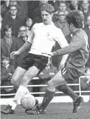  ??  ?? John Moore (left) in action for Luton Town, 50 years ago this month