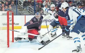  ?? ADAM CAIRNS/COLUMBUS DISPATCH ?? Blue Jackets goaltender Joonas Korpisalo and his teammates did not allow the Jets to score a 5-on-3 power-play goal Thursday, even though Winnipeg had three tries.