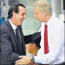  ?? AFP ?? Spaniard Unai Emery (left) takes over from Arsene Wenger.