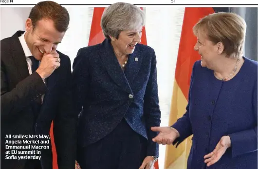  ??  ?? All smiles: Mrs May, Angela Merkel and Emmanuel Macron at EU summit in Sofia yesterday