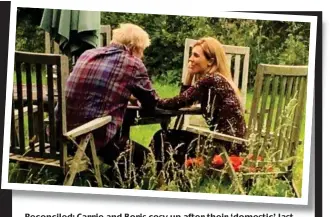  ??  ?? Reconciled: Carrie and Boris cosy up after their ‘domestic’ last year. The picture was widely believed to have been staged