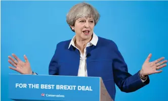  ??  ?? Britain’s Prime Minister and leader of the Conservati­ve party, Theresa May, delivers a general election campaign speech in Wolverhamp­ton, central England, on Tuesday, as campaignin­g continues in the build up to the general election on June 8. (AFP)
