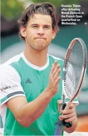  ??  ?? Dominic Thiem after defeating Novak Djokovic in the French Open quarterfin­al on Wednesday.