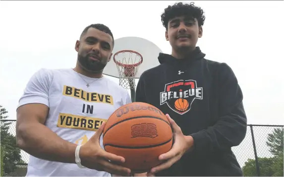  ?? BLAIR CRaWFORD ?? Former basketball pro Jamil Abiad, left, and 16-year-old Salih Halawa are participan­ts at the basketball camp Abiad runs on courts near Woodroffe High School.