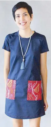  ??  ?? Contrast stitching and over-sized red dawendawen (leaves) highlight this Yakan-inspired dress by Linea Etnika.