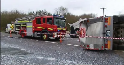  ??  ?? Emergency services at the scene of a collision between two lorries at Ballymacqu­irke Cross earlier this month. Photo: Adrian Grajewski.