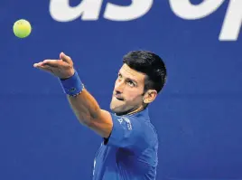  ?? ROBERT DEUTSCH • USA TODAY SPORTS ?? Novak Djokovic serves the ball against Damir Dzumhur on Day 1 of the 2020 U.S. Open tennis tournament in Flushing Meadows, N.Y., on Aug. 31, 2020.