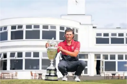  ?? Picture: R& A ?? British Amateur champion Joe Long with the trophy at Royal Birkdale